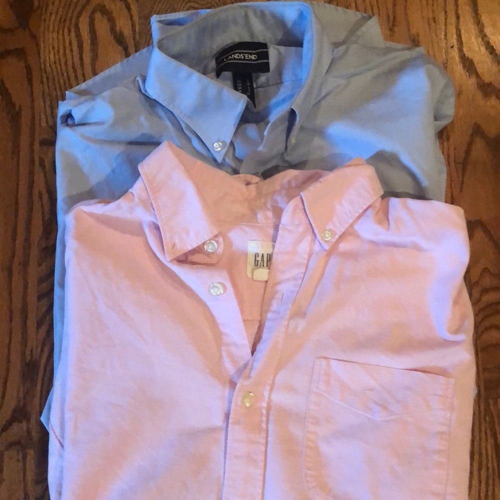 2 men’s long sleeve polo shirts.